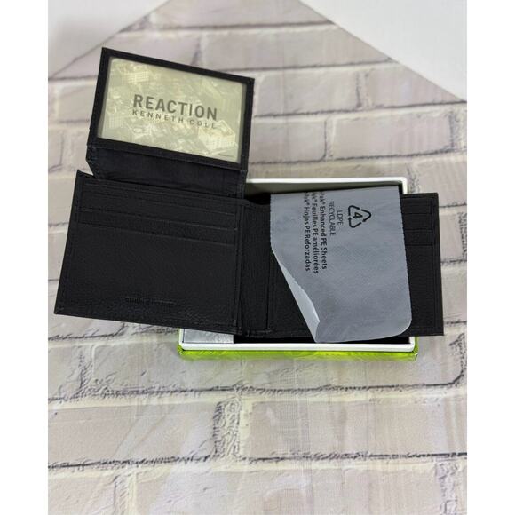 NEW REACTION KENNETH COLE HAND CRAFTED LEATHER BLACK BI-FOLD WALLET - Picture 1 of 3